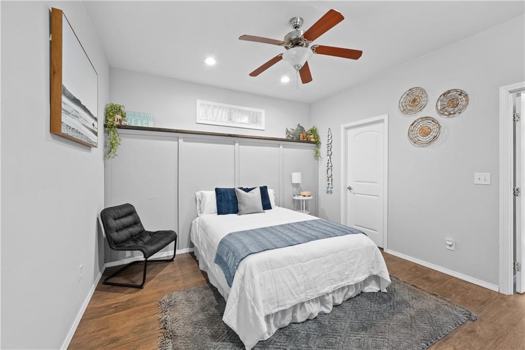 129 Boulder View Court Dallas, GA 30157 - Photo 32 of 43 a bedroom with a bed and a window