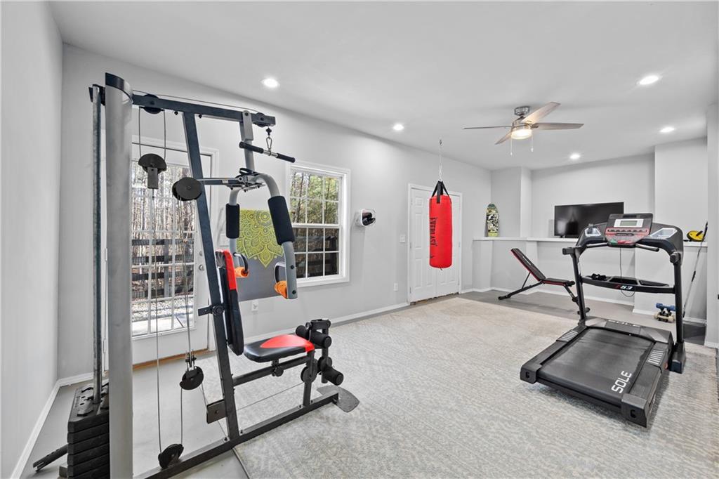 129 Boulder View Court Dallas, GA 30157 - Photo 33 of 43 a room with gym equipment and white walls