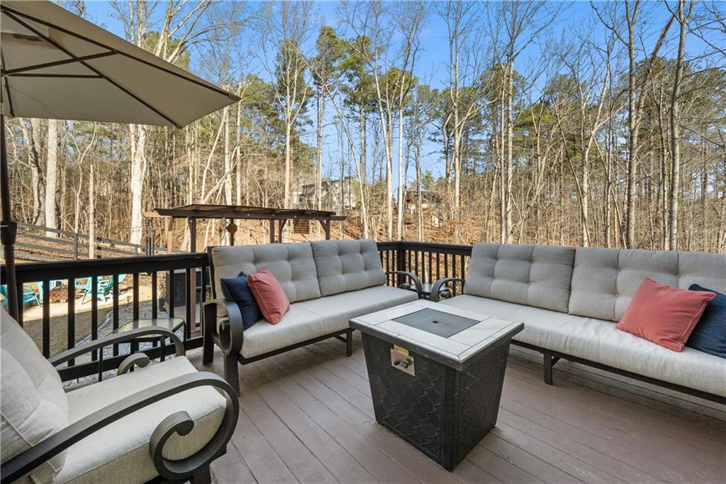 129 Boulder View Court Dallas, GA 30157 - Photo 35 of 43 a living room with furniture and a large window