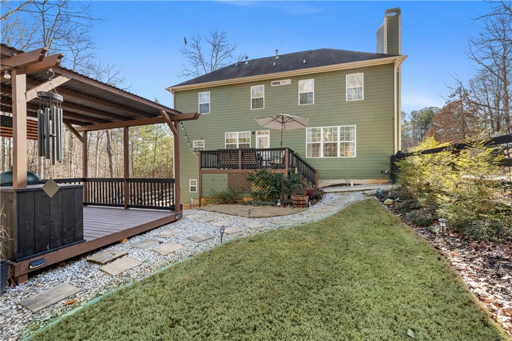 129 Boulder View Court Dallas, GA 30157 - Photo 39 of 43 a front view of a house with a yard