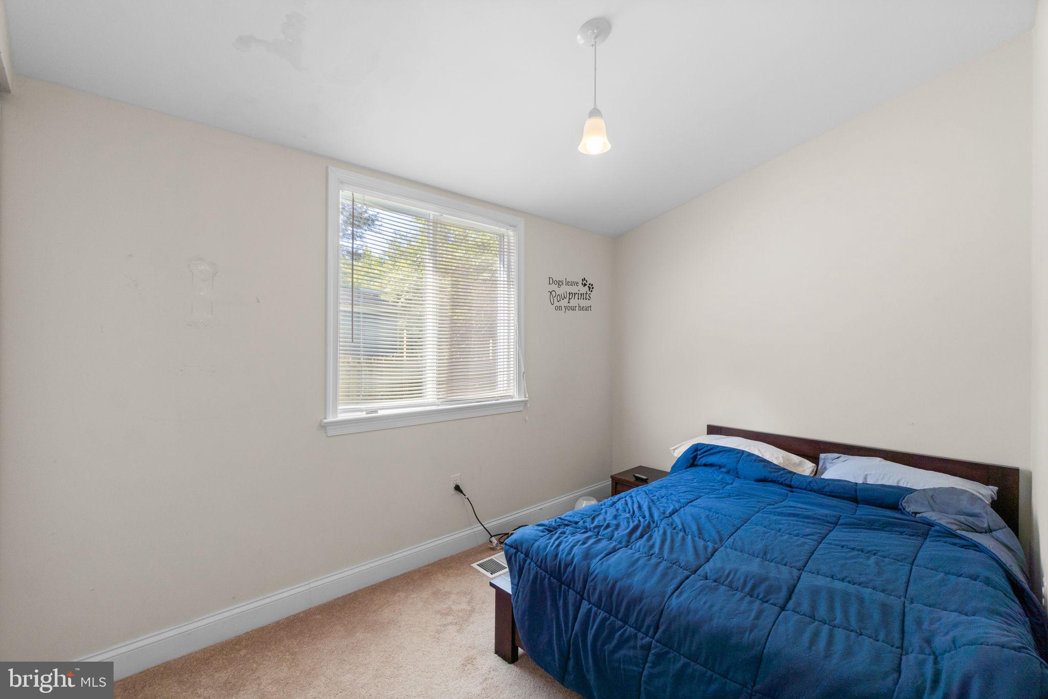 9528 Wandering Way Columbia, MD 21045 - Photo 23 of 29 a bedroom with a bed and a window