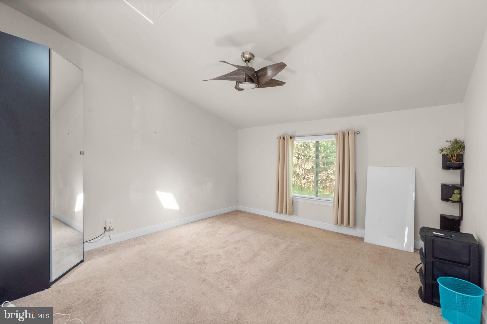9528 Wandering Way Columbia, MD 21045 - Photo 24 of 29 a view of an empty room with a window