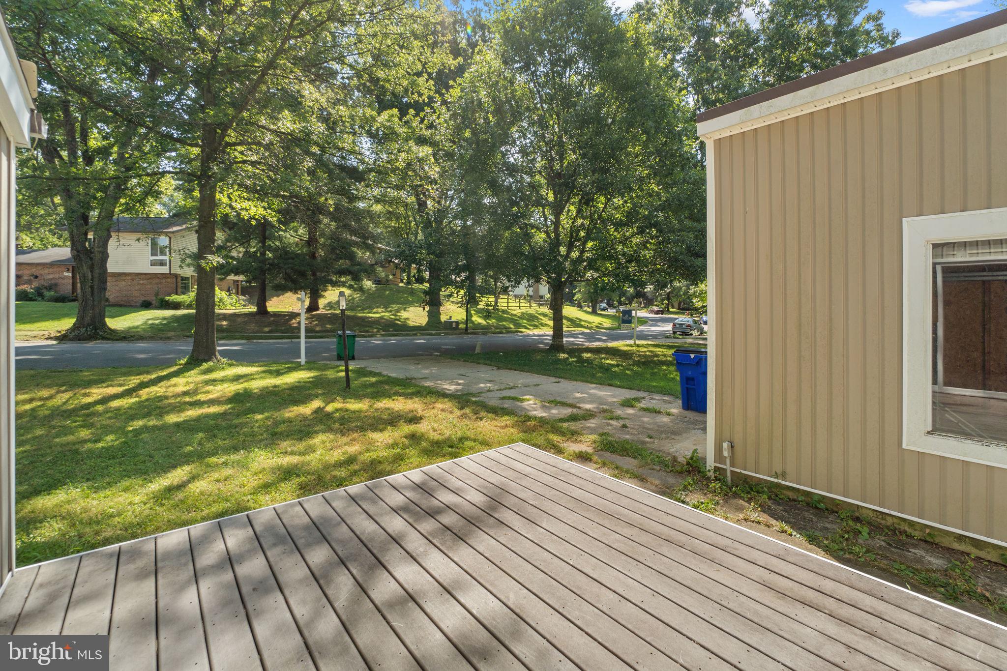 9528 Wandering Way Columbia, MD 21045 - Photo 26 of 29 a view of a yard with wooden floor