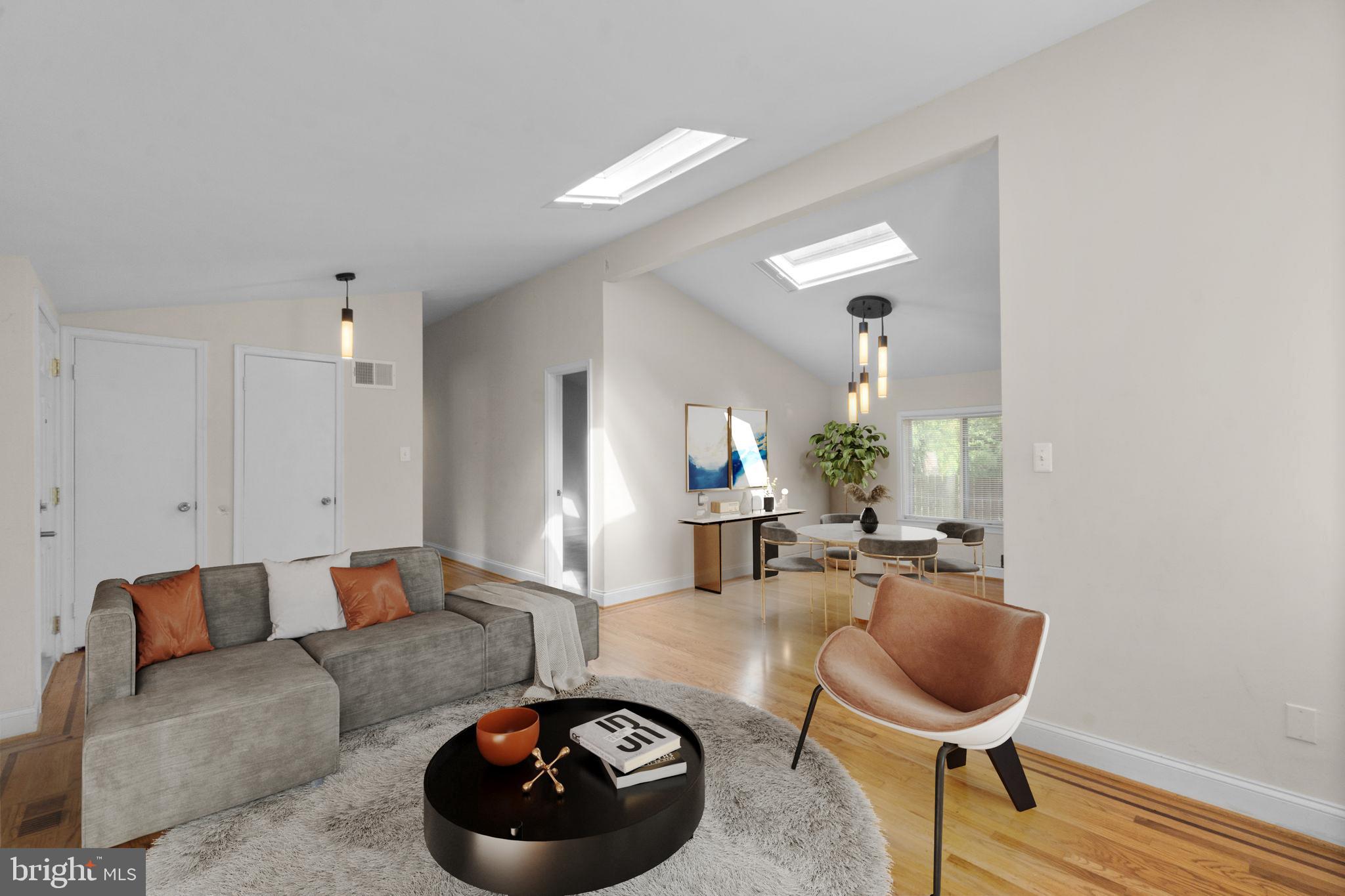 9528 Wandering Way Columbia, MD 21045 - Photo 5 of 29 a living room with furniture and a wooden floor