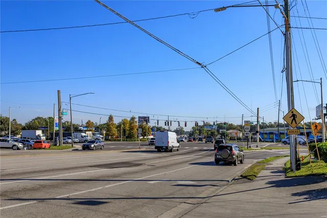 a view of road with cars