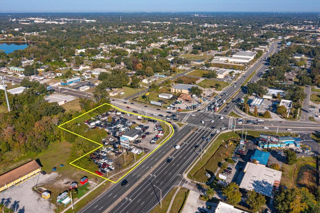 402 South Kirkman Road Orlando, FL 32835 - Photo 2 of 8 an aerial view of residential houses with outdoor space