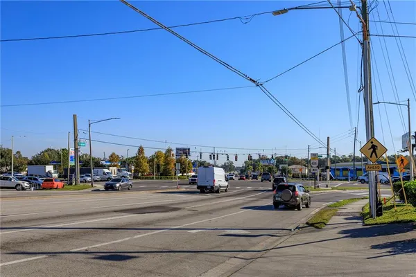 a view of road with cars