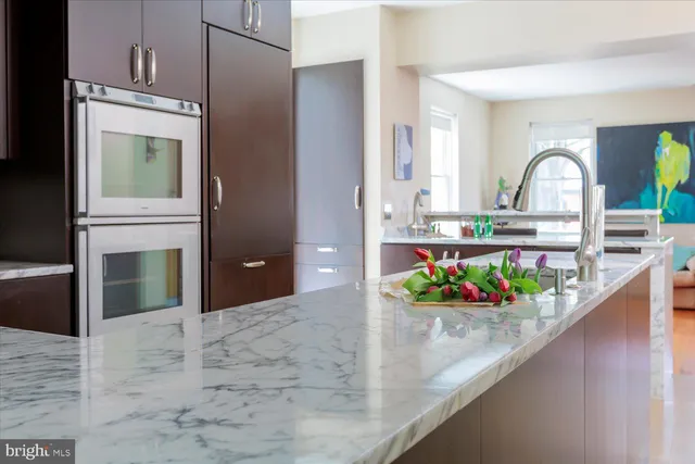 a view of a living room and dining room