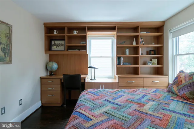 a bathroom with a sink and a window