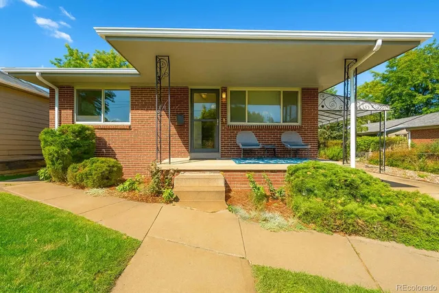 a view of a house with a swimming pool