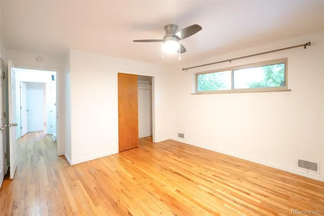 a view of a livingroom with wooden floor