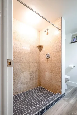 a room with cabinets and wooden floor