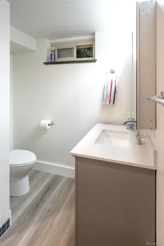 a utility room with sink dryer and washer