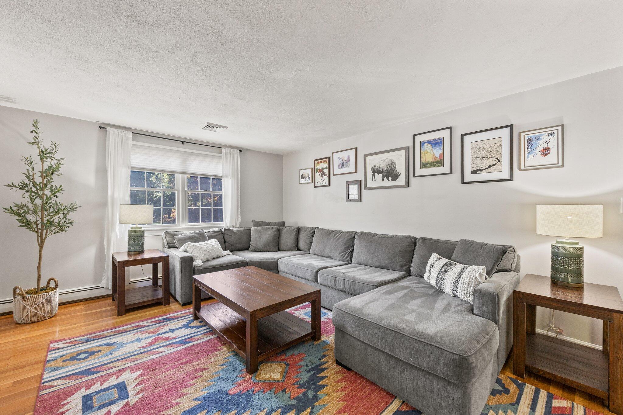 39 Maddaket Lane Centerville, MA 02632 - Photo 15 of 36 a living room with furniture and a potted plant