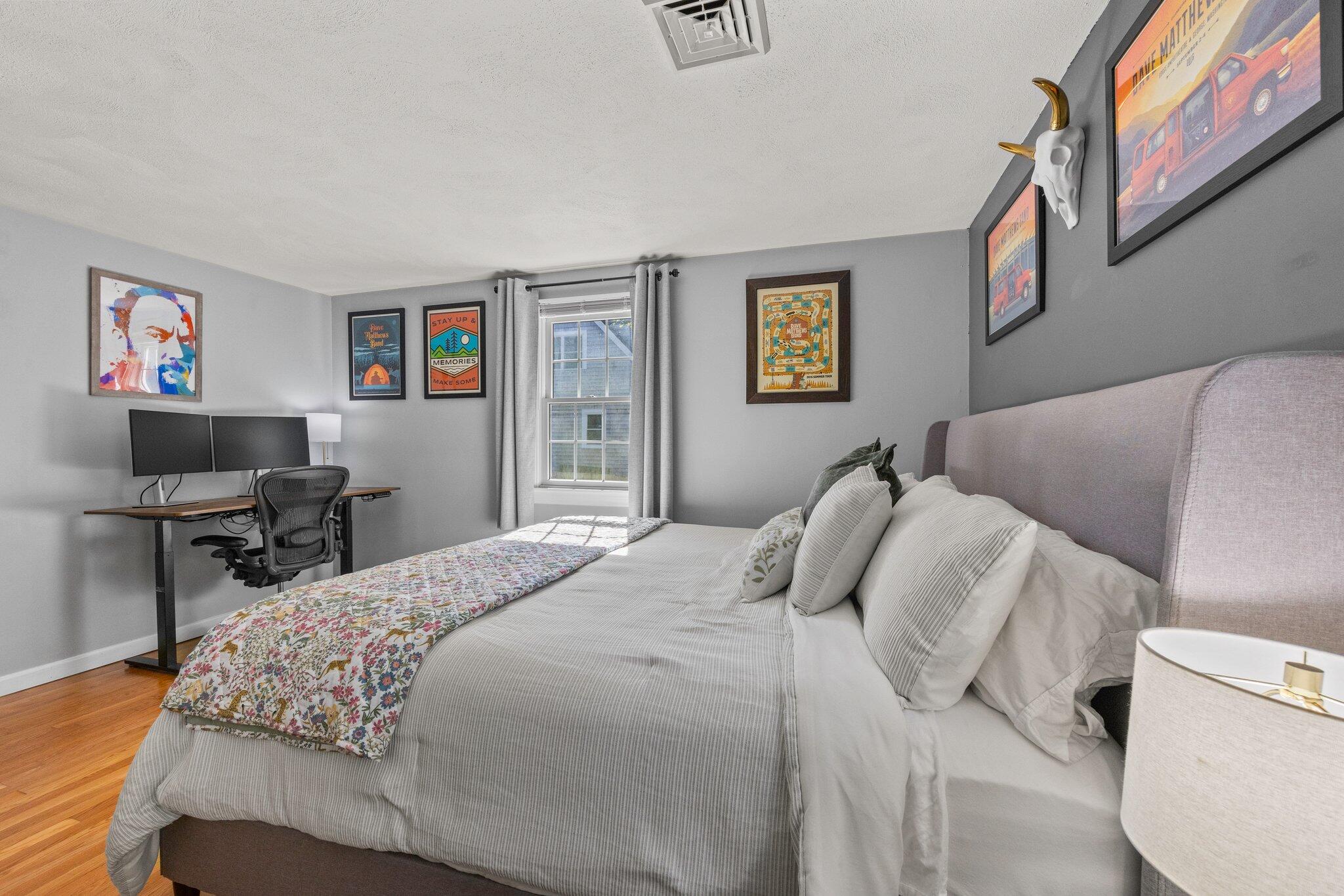 39 Maddaket Lane Centerville, MA 02632 - Photo 24 of 36 a bedroom with a bed and a desk