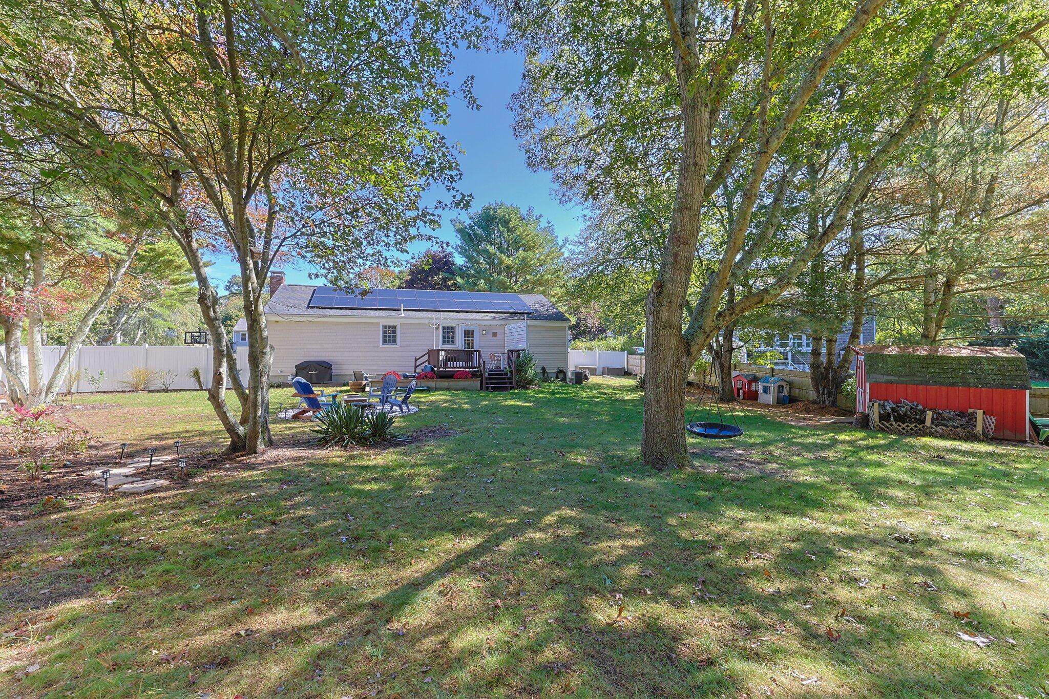 39 Maddaket Lane Centerville, MA 02632 - Photo 30 of 36 a view of a house with backyard and a tree