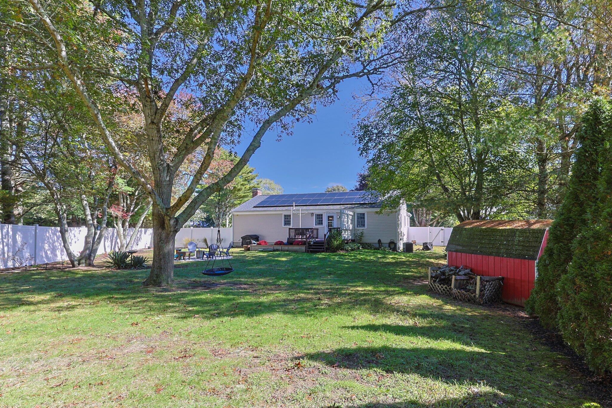 39 Maddaket Lane Centerville, MA 02632 - Photo 31 of 36 a view of a house with a yard