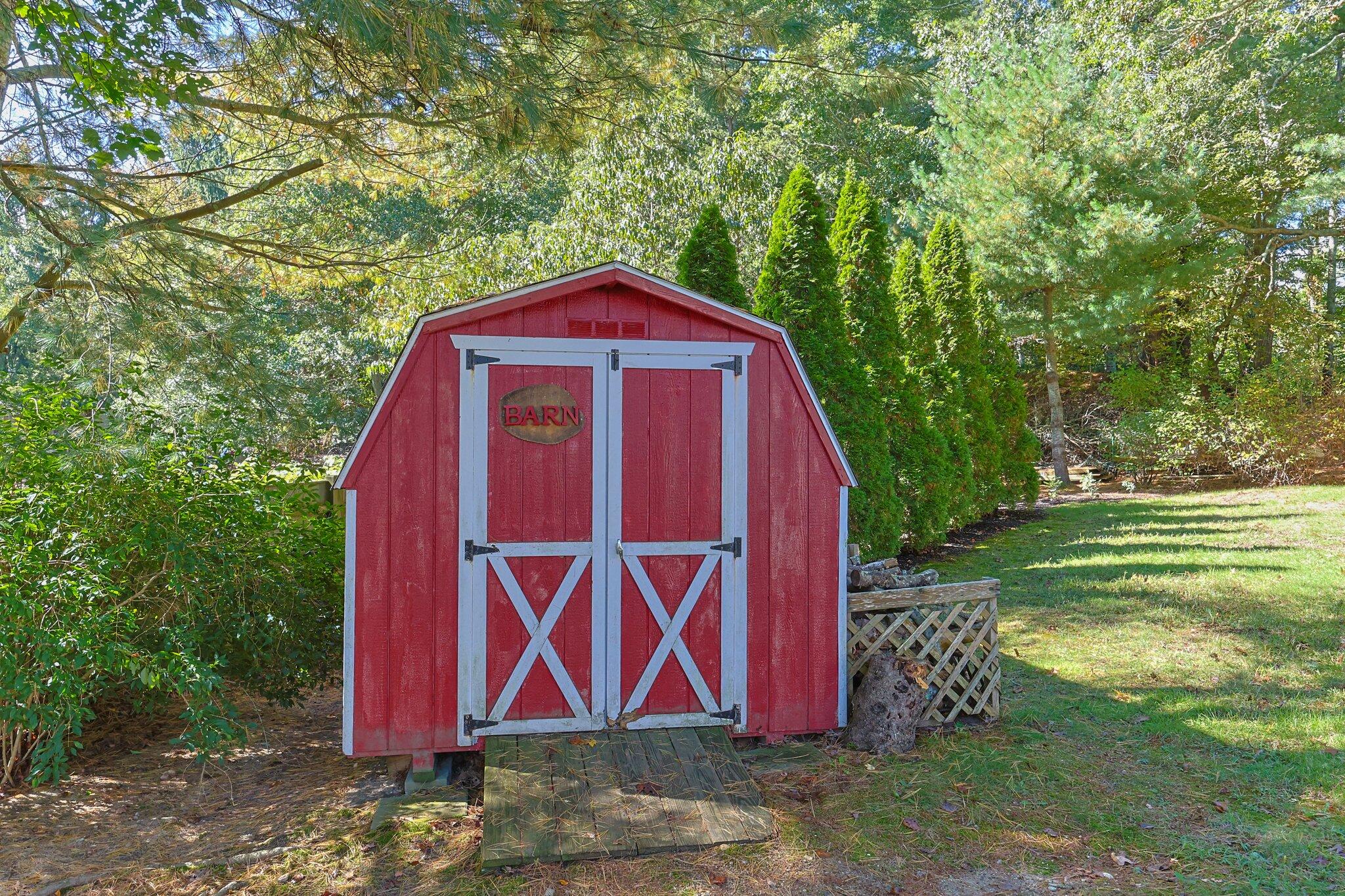 39 Maddaket Lane Centerville, MA 02632 - Photo 33 of 36 a view of front of a house with a yard