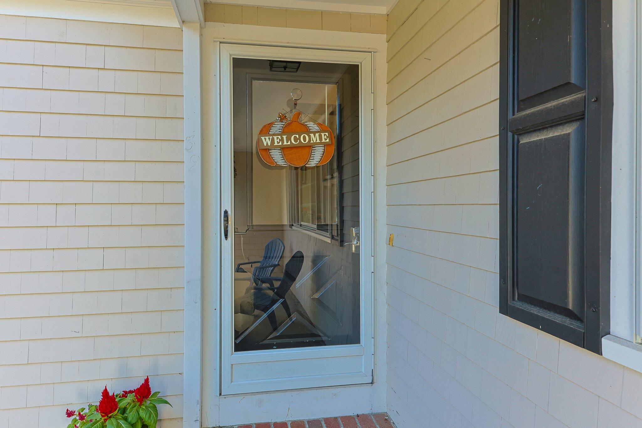 39 Maddaket Lane Centerville, MA 02632 - Photo 6 of 36 a view of a door and a window