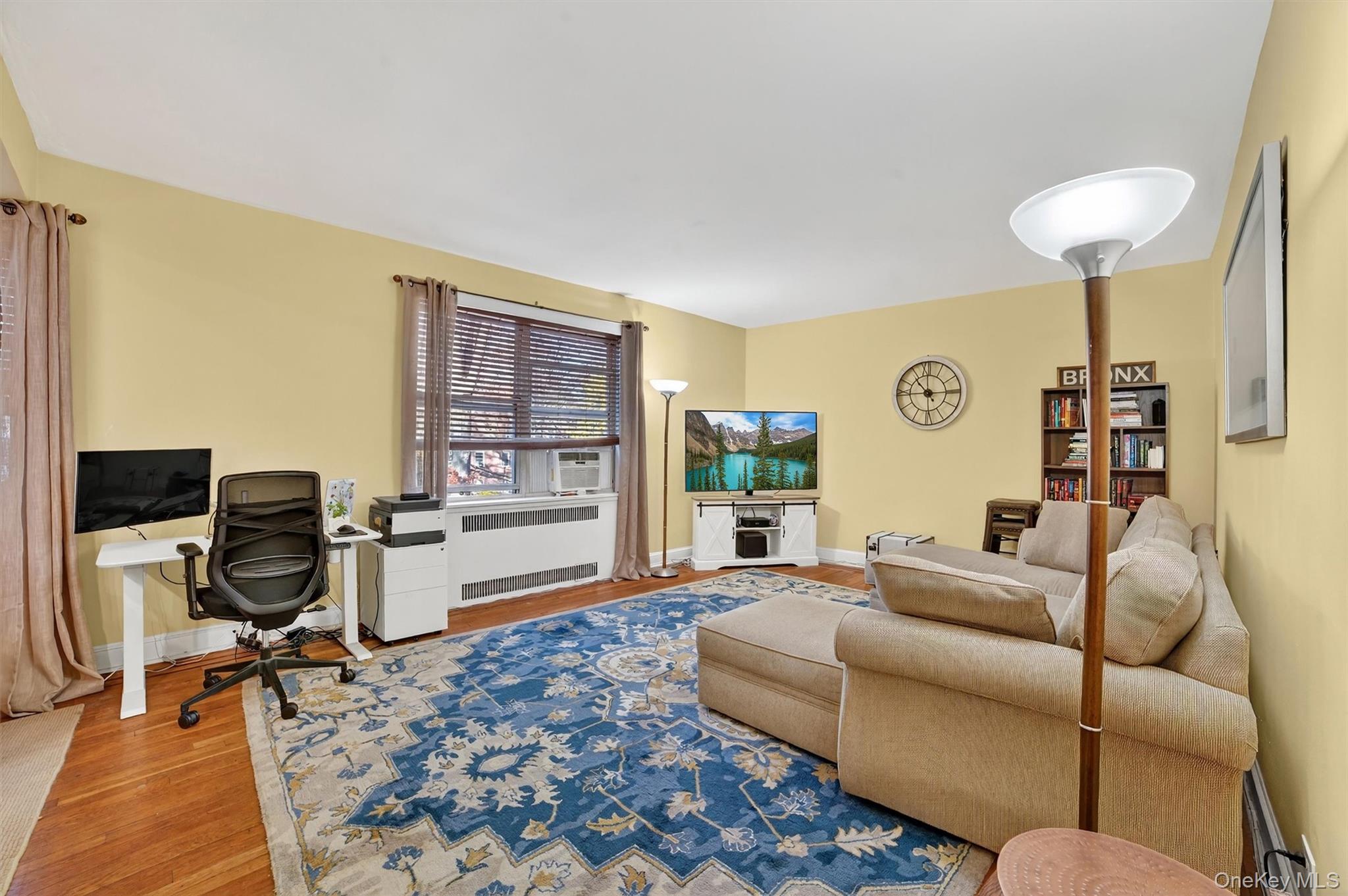 824 Palmer Road, Unit 2D Bronxville, NY 10708 - Photo 11 of 29 a living room with furniture and a window