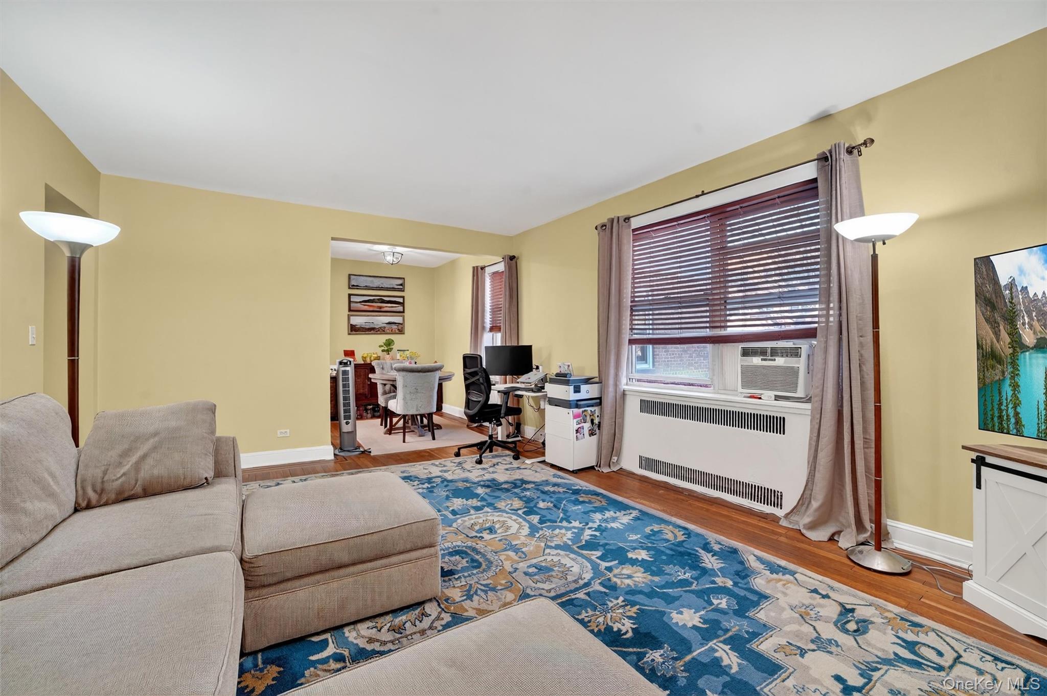 824 Palmer Road, Unit 2D Bronxville, NY 10708 - Photo 15 of 29 a living room with furniture and a window