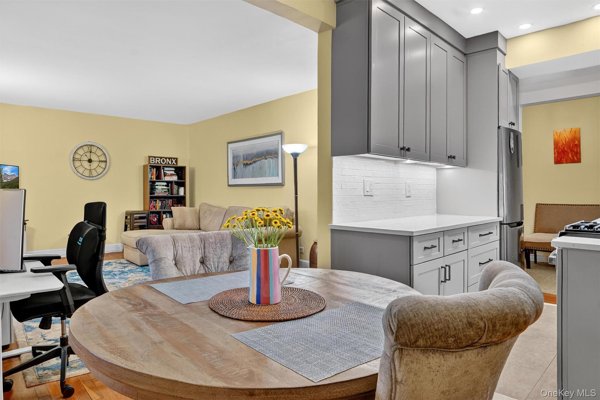 824 Palmer Road, Unit 2D Bronxville, NY 10708 - Photo 17 of 29 a living room with furniture flowerpot and a fireplace