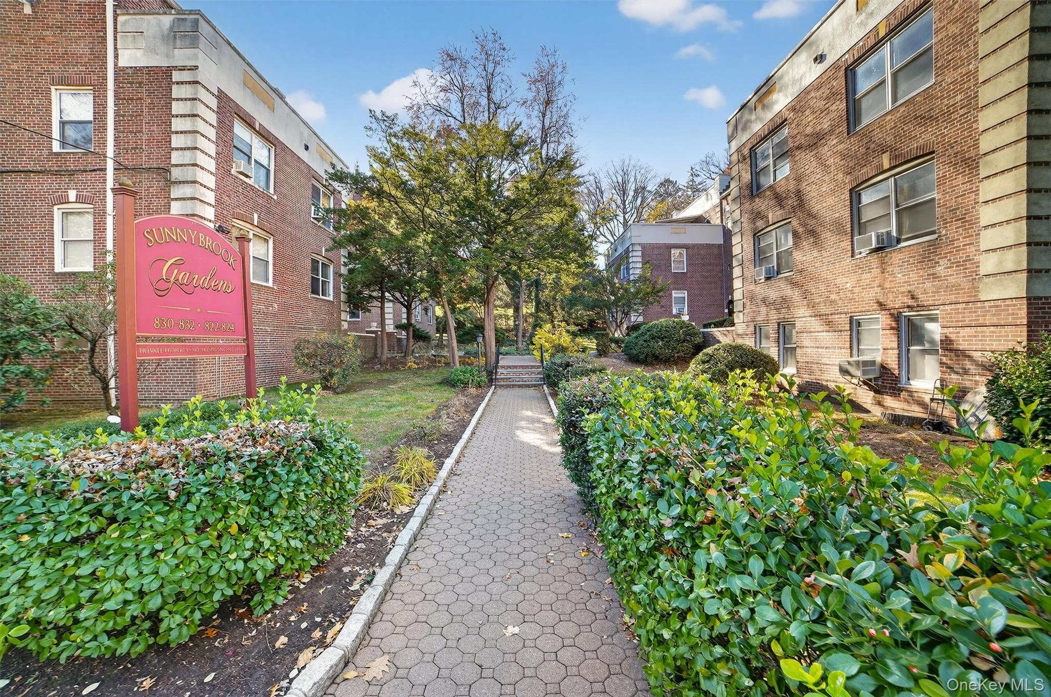 824 Palmer Road, Unit 2D Bronxville, NY 10708 - Photo 2 of 29 a view of a pathway both side of building