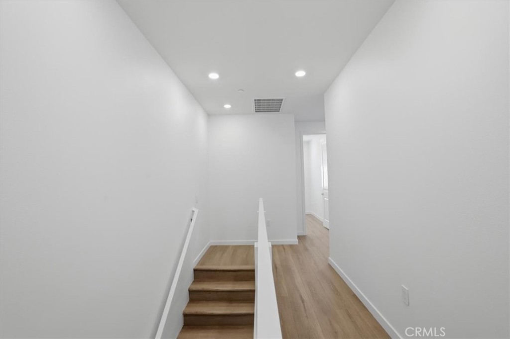 2378 Channel Drive, Unit 103 Ventura, CA 93003 - Photo 12 of 33 a view of entryway with wooden floor