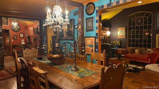 315 Thompsonville Road Monticello, NY 12701 - Photo 16 of 31 a view of a dining room with furniture and chandelier