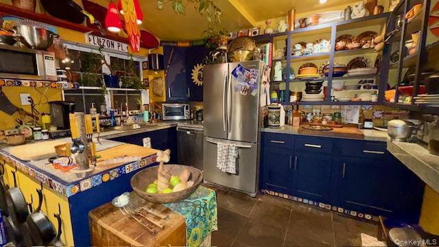 315 Thompsonville Road Monticello, NY 12701 - Photo 20 of 31 a room with water heater and wooden cabinets