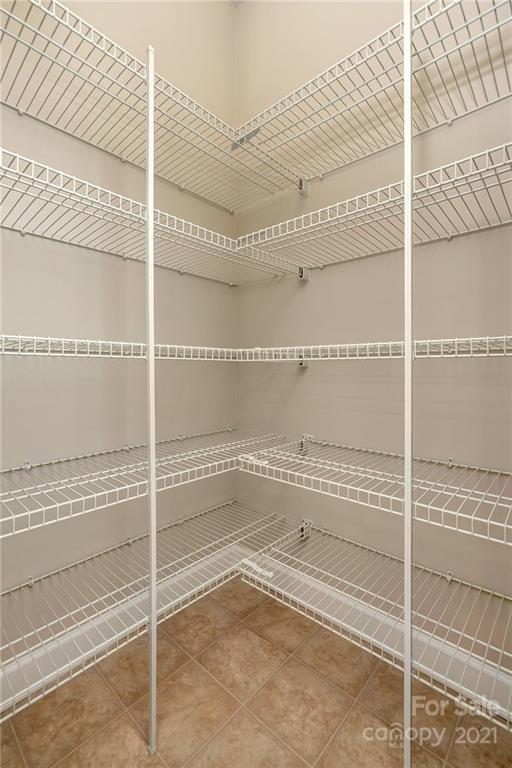 6931 Maricopa Road Charlotte, NC 28277 - Photo 13 of 31 a view of a walk in closet with empty racks