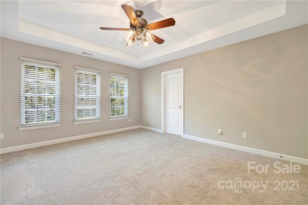 6931 Maricopa Road Charlotte, NC 28277 - Photo 18 of 31 a view of an empty room with a window