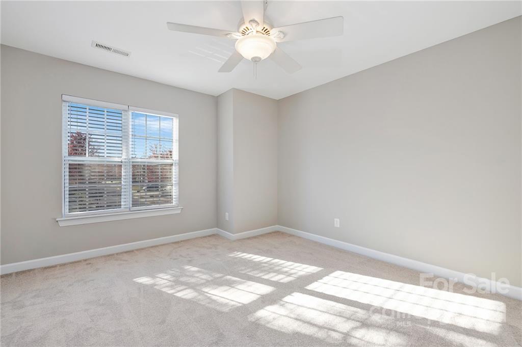 6931 Maricopa Road Charlotte, NC 28277 - Photo 22 of 31 a view of an empty room with a window
