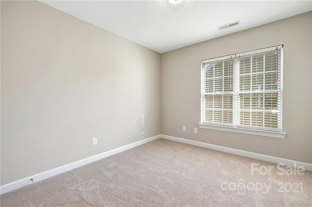 6931 Maricopa Road Charlotte, NC 28277 - Photo 24 of 31 an empty room with a window