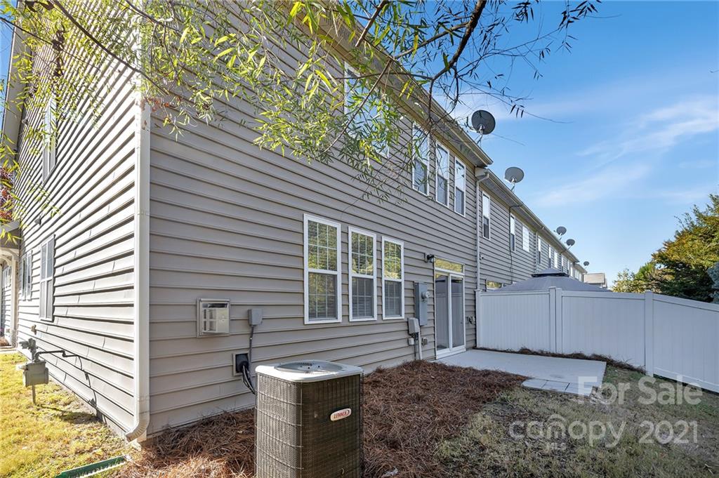 6931 Maricopa Road Charlotte, NC 28277 - Photo 28 of 31 a view of a house with a yard