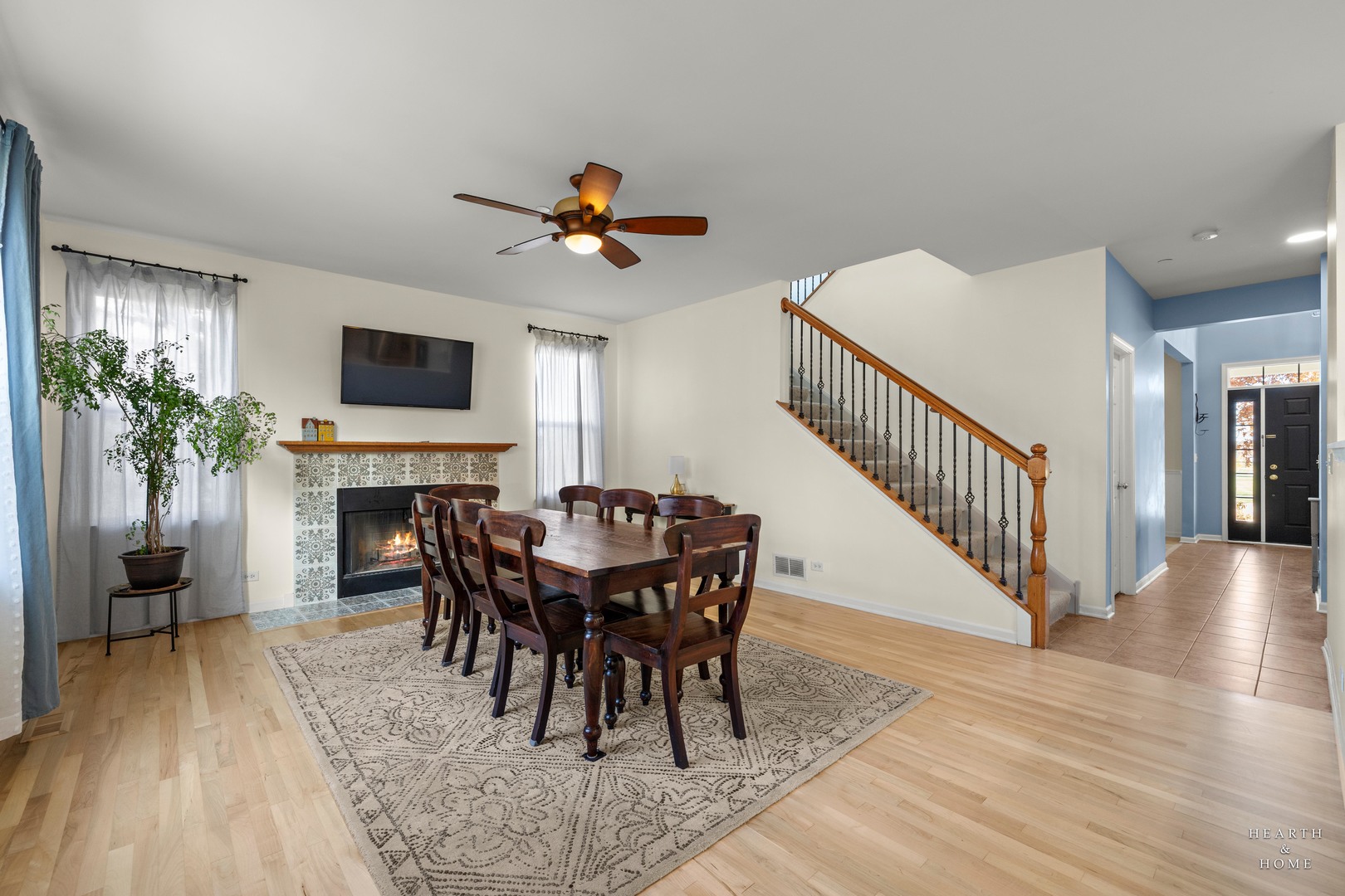 11561 Beacon Avenue Huntley, IL 60142 - Photo 12 of 36 a view of a dining room with furniture window and wooden floor