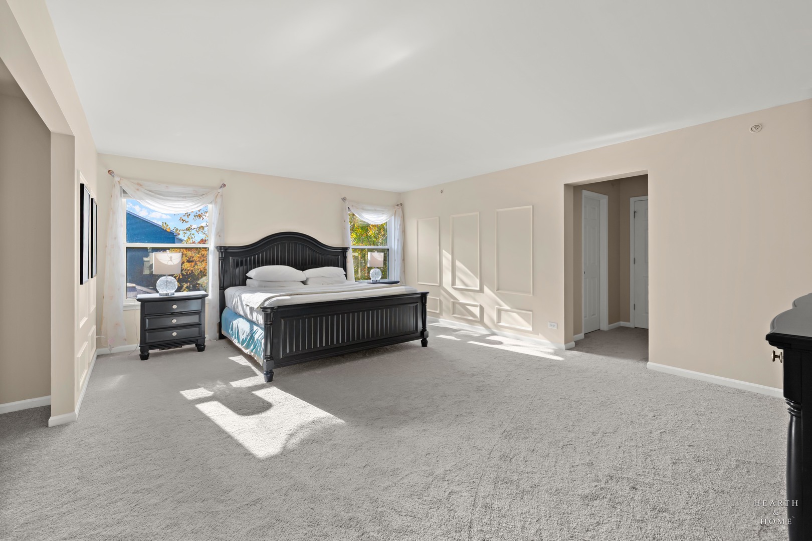 11561 Beacon Avenue Huntley, IL 60142 - Photo 18 of 36 a spacious bedroom with a bed and a cabinets