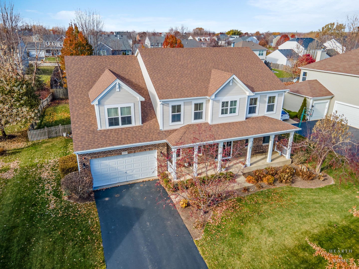 11561 Beacon Avenue Huntley, IL 60142 - Photo 2 of 36 a front view of a house with a yard