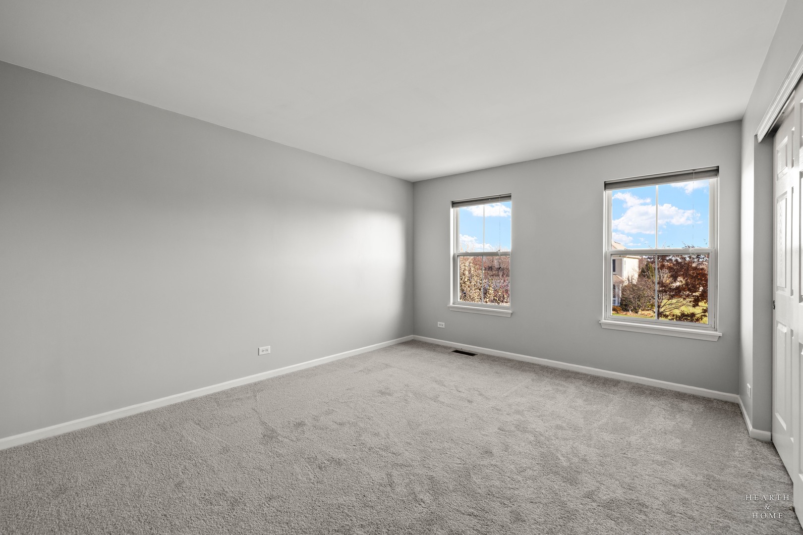 11561 Beacon Avenue Huntley, IL 60142 - Photo 24 of 36 an empty room with windows