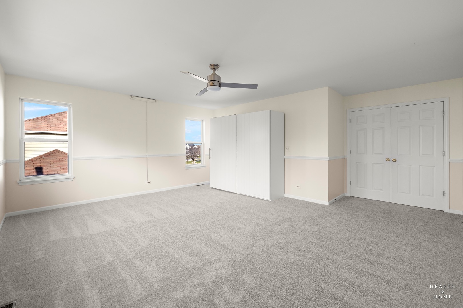 11561 Beacon Avenue Huntley, IL 60142 - Photo 26 of 36 a view of an empty room with a ceiling fan