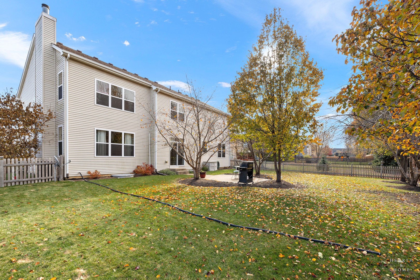 11561 Beacon Avenue Huntley, IL 60142 - Photo 32 of 36 a house view with swimming pool in front of it