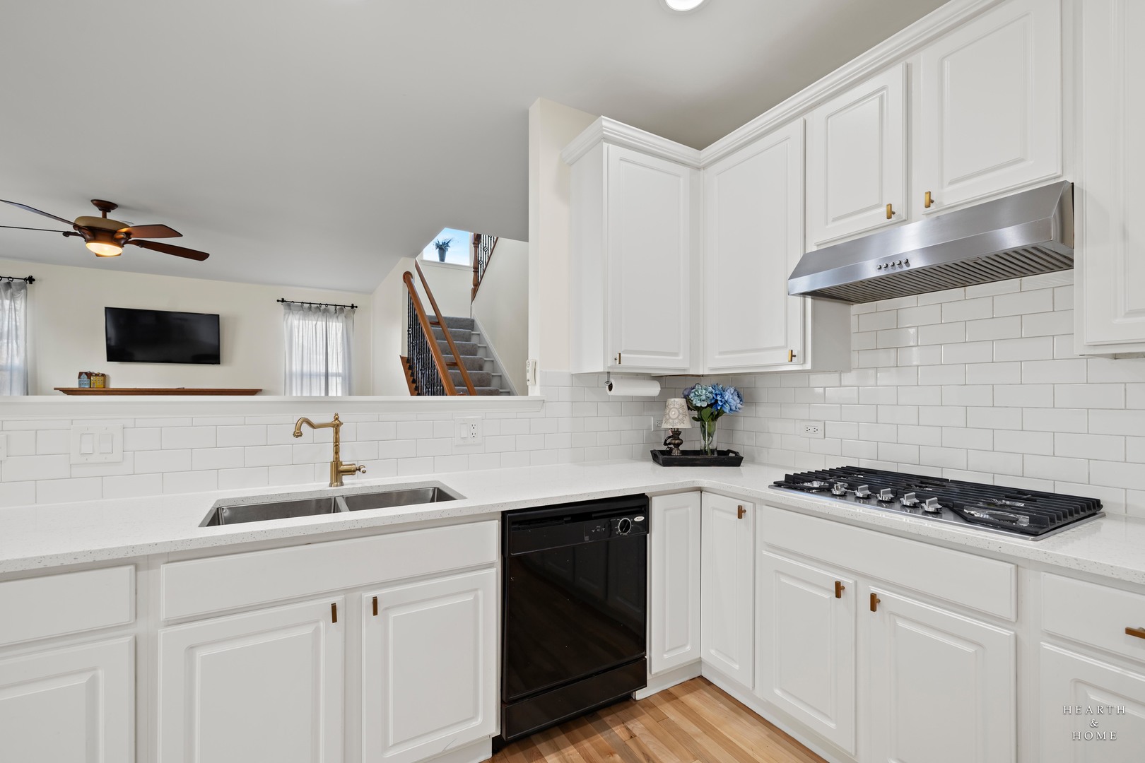11561 Beacon Avenue Huntley, IL 60142 - Photo 10 of 36 a kitchen with a sink stove and cabinets