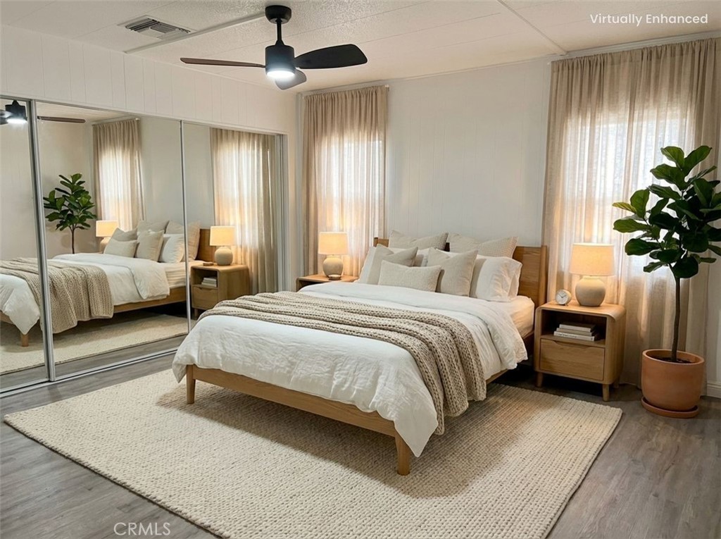 840 East Foothill Boulevard, Unit 144 Azusa, CA 91702 - Photo 6 of 6 a spacious bedroom with a bed and potted plant