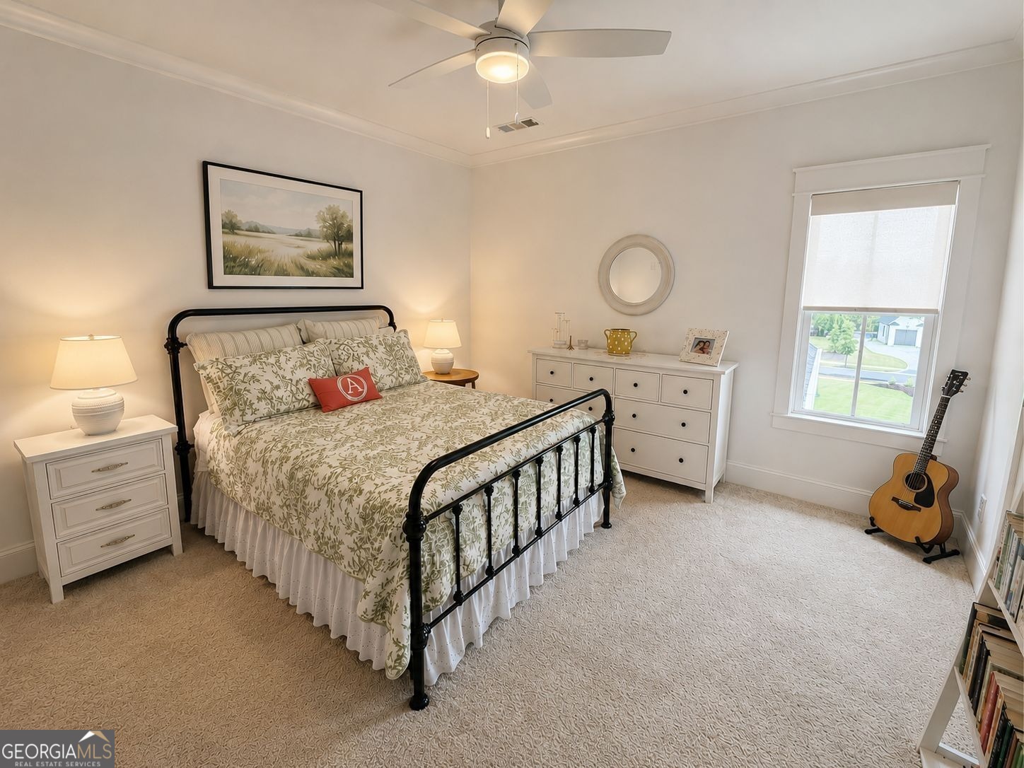 913 Indigo Bunting Road Statham, GA 30666 - Photo 24 of 31 a room with a bed and a chandelier