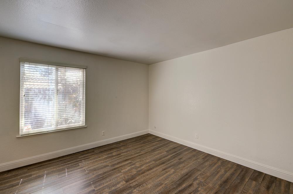 2909 Huntington Boulevard, Unit 211 Fresno, CA 93721 - Photo 15 of 26 Spacious Bedroom