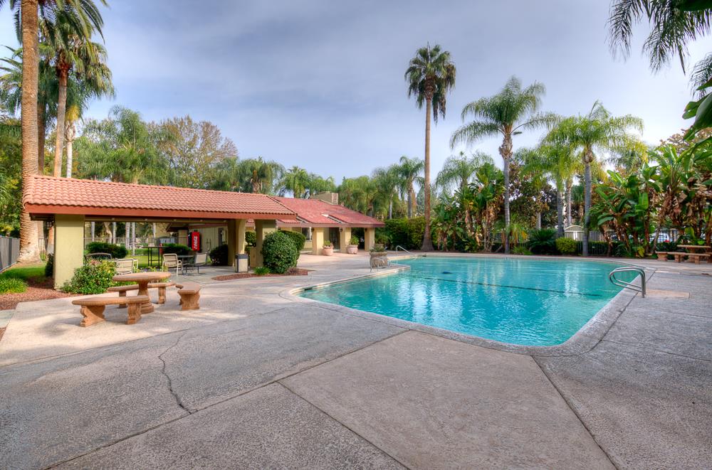 2909 Huntington Boulevard, Unit 211 Fresno, CA 93721 - Photo 23 of 26 Clubhouse and community pool
