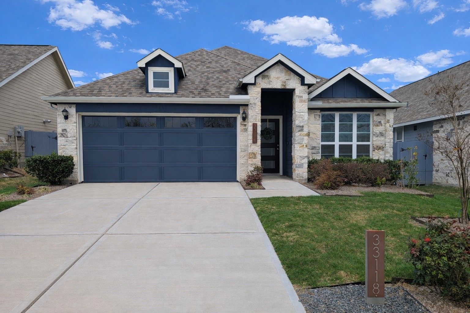 33118 School Hl Road Fulshear, TX 77441 - Photo 1 of 21 a front view of a house with a yard and garage