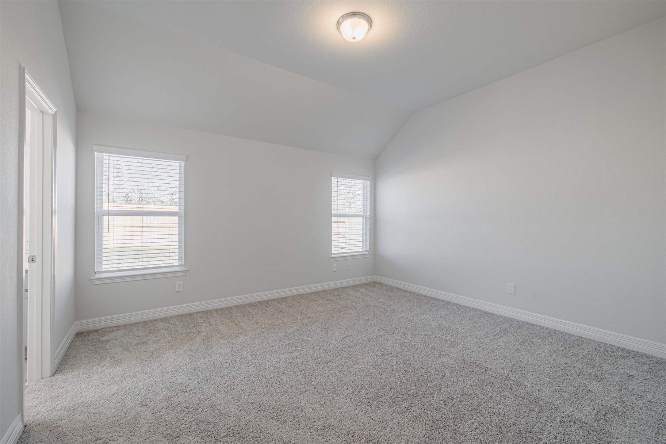 33118 School Hl Road Fulshear, TX 77441 - Photo 12 of 21 an empty room with a window