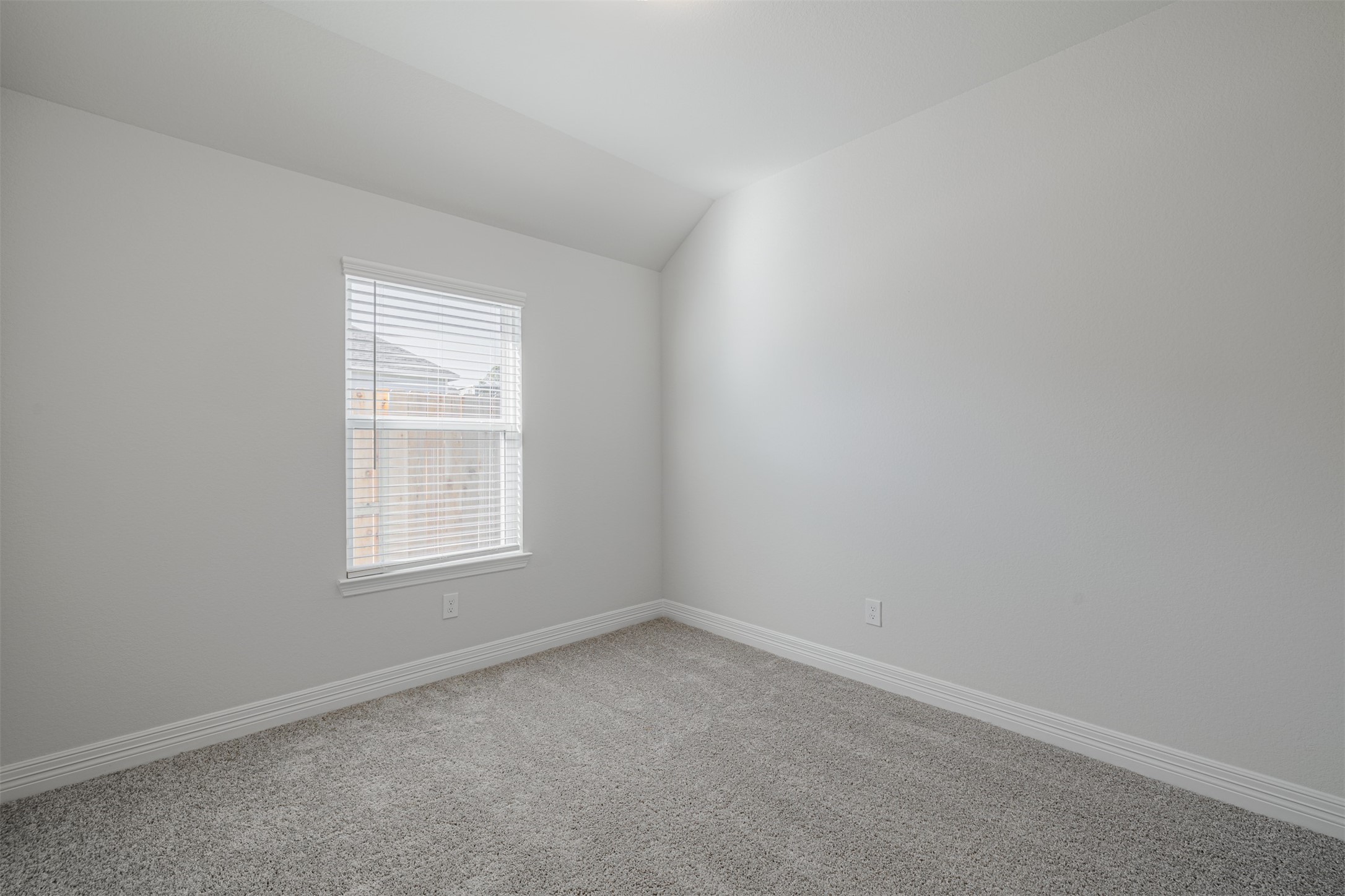 33118 School Hl Road Fulshear, TX 77441 - Photo 16 of 21 an empty room with a window