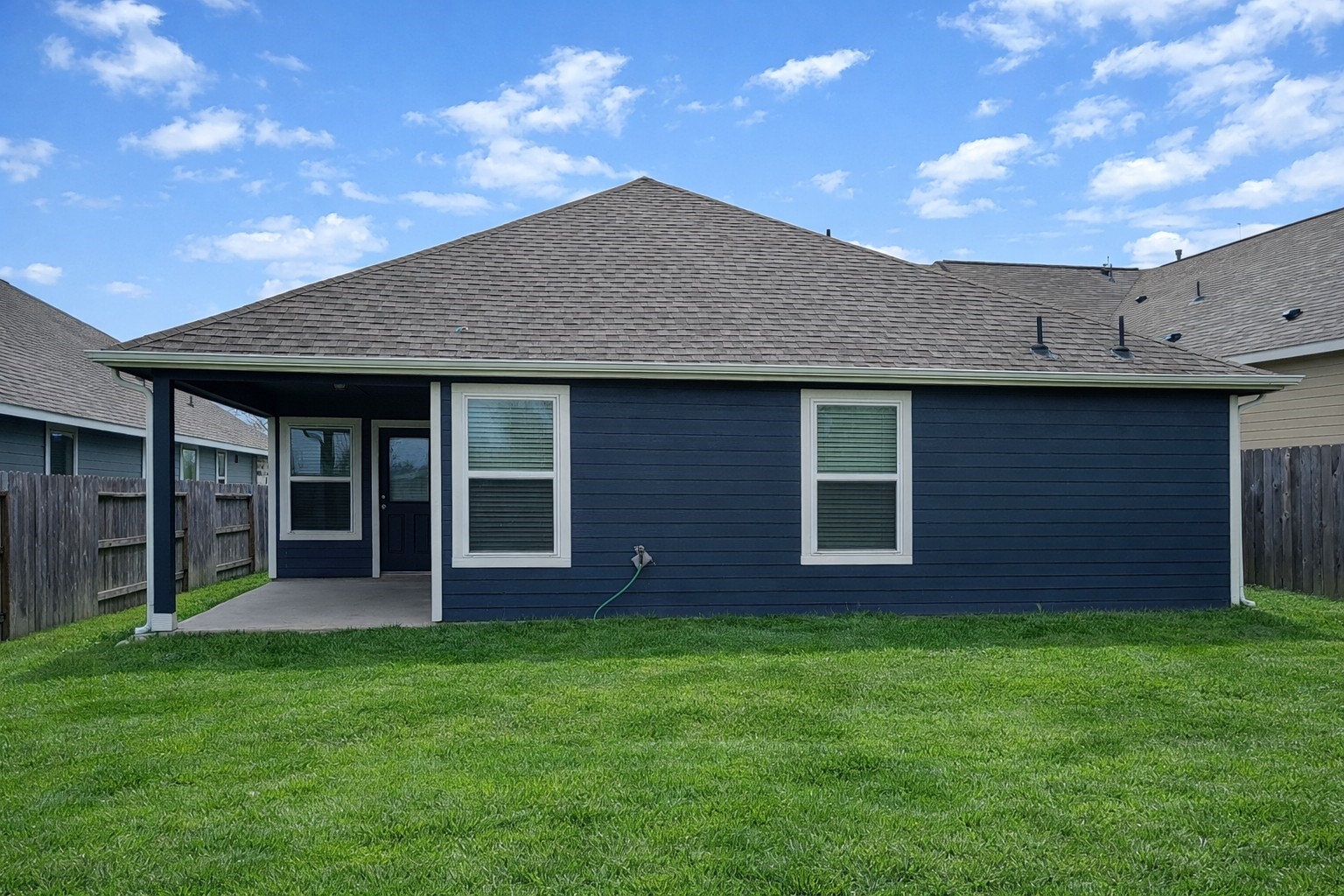 33118 School Hl Road Fulshear, TX 77441 - Photo 20 of 21 a view of a house with a garden